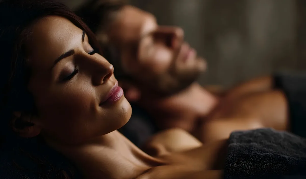 Serene couple resting with eyes closed enjoying profound relaxation and int y together in a tranquil spa environment highlighting wellness and comfort